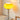 Gele glazen tafellamp met chromen voet, moderne verlichting, decoratieve woonaccessoire.