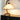 Kira tafellamp, beige kap, houten boog, modern design, sfeerverlichting, woonkamer decor.
