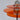 Oranje UFO tafellamp met chromen details en glazen bol, modern design, interieurverlichting.