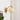 Art Deco vintage wandlamp, goudkleurig met glazen kap, retro design, interieurverlichting.