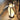 Moderne witte tafellamp in bananenvorm, sfeerverlichting, zwart accent, woonkamer decor.