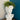 Witte David-buste plantenbak met groene bladeren, decoratief beeld, moderne interieurstijl.