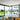 Moderne witte Chio wandlamp in minimalistisch interieur, LED-verlichting, energiezuinig design.
