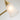 Gouden wandlamp met drie lichten, matglas, Elstead Lighting Quoizel, modern design.