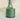 Groene tafellamp met bloemvorm, modern design, metalen basis, decoratieve verlichting.