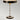 Zwart-witte tafellamp met gouden details, Elstead Lighting Flambeau, modern design.