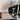 Retro flipklok, zwart-wit, metalen basis, industrieel design, moderne tafelklok, interieurdecoratie.