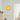 Oranje ronde wandlamp in moderne woonkamer, houten kast, witte gordijnen.