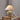 Fluted keramische tafellamp, beige kap, decoratieve verlichting, woonkamer, modern design.