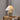 Fluted keramische tafellamp, beige, textiel kap, decoratieve verlichting, woonkameraccessoire.