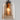 Glazen hanglamp met gloeilamp, modern design, amberkleurig glas, interieurverlichting.