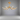 Moderne gouden LED plafondlamp, gebogen design, energiezuinig, eigentijdse verlichting.