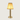 Gouden tafellamp met stoffen kap, modern design, sfeerverlichting, interieurdecoratie.