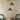 Groene hanglampen in moderne woonkamer, Scandinavisch design, minimalistische inrichting.