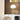 Chromen tafellamp met halve bol, modern design, glanzend, voor woonkamer of kantoor.