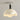 Moderne beige plafondlamp met golvende kap en zwarte accenten, stijlvolle verlichting.