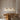 Drie hanglampen boven houten eettafel, Scandinavisch design, minimalistisch interieur.