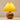 Gele tafellamp met houten bolvormige voet en geplooide kap, sfeerverlichting, modern design.