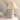 Witte tafellamp met geplooide kap, keramische basis, modern design, interieurdecoratie.