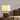 Textuur keramische tafellamp, beige lampenkap, modern design, woonkamer verlichting.
