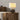 Textuur keramische tafellamp, bolvormig, metaalgrijs, moderne woondecoratie, sfeerverlichting.