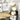 Chromen tafellamp met drie bollen, modern design, glanzend metaal, sfeerverlichting.