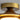 Gouden plafondlamp met houten details, moderne LED-verlichting, Olav design.