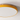 Ronde plafondlamp hout en geel, moderne LED-verlichting, energiezuinig design.