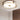 Gouden plafondlamp met glazen panelen, modern design, woonkamerverlichting.
