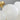 Gouden prisma kroonluchter met witte glazen schijven, modern design, luxe verlichting.