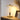 Gouden tafellamp met glazen kap op houten tafel, moderne verlichting, interieurdecoratie.
