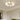 Moderne plafondlamp met witte glazen bollen, groene accenten, woonkamerverlichting, designstijl.