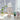 Witte hars robot tafellamp op vensterbank met planten en speelgoed, moderne interieurdecoratie.