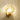 Gouden schelp wandlamp, glazen kap, sfeerverlichting, modern interieur, wanddecoratie.