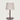 Bruine houten tafellamp met beige stoffen kap, modern design, geschikt voor woonkamer.