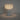 Moderne witte tafellamp met geribbelde kap, sfeerverlichting, minimalistisch design.