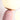 Roze tafellamp met ronde witte glazen kap en gouden details, moderne verlichting.