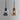 Twee glazen hanglampen, zwart en brons, modern design, E27 fitting, industrieel interieur.