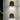 Twee moderne wandlampen, boogvormig, brons en grijs, minimalistisch design, interieurverlichting.