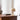 Beige tafellamp op houten bureau, modern design, Valencia lamp, interieurdecoratie.