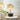 Veli tafellamp, wit, modern design, stoffen kap, metalen standaard, sfeerverlichting, interieur.