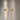 Twee moderne wandlampen met gouden en zwarte accenten, bloemmotief, LED-verlichting.