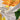 Zonnebloem print stof, kleurrijk katoen, decoratief textiel, bloemenmotief, geel en groen.