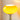 Gele glazen tafellamp met chromen voet, moderne verlichting, interieurdecoratie.
