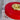 Rode tafellamp met gouden details, moderne designlamp, Revolve, interieurverlichting.