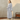 Vrouw in grijze fleece badjas met ceintuur, comfortabele loungewear, zachte stof.