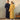 Twee personen in blauwe en gele badjassen, comfortabele ochtendkleding, uniseks design.