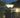 Zonne-energie tuinlamp op hekpaal, warm wit licht, regenbestendig, moderne buitenverlichting.
