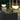Tuinverlichting op pilaren, modern design, LED, buitenlampen, sfeerverlichting, zwart en wit.