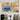 Bureau met computer, boekenplanken, bureaulamp, en decoratieve items in moderne kantoorruimte.
